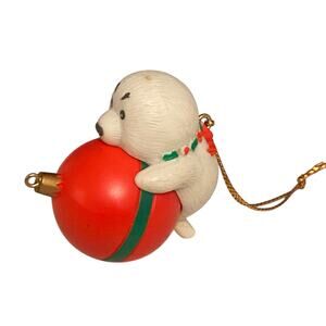 Vintage 1993 Seal Hugging a Christmas Ornament